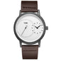 Minimalist men's leather watch by Alcom Distribution with brown strap and dual dial design