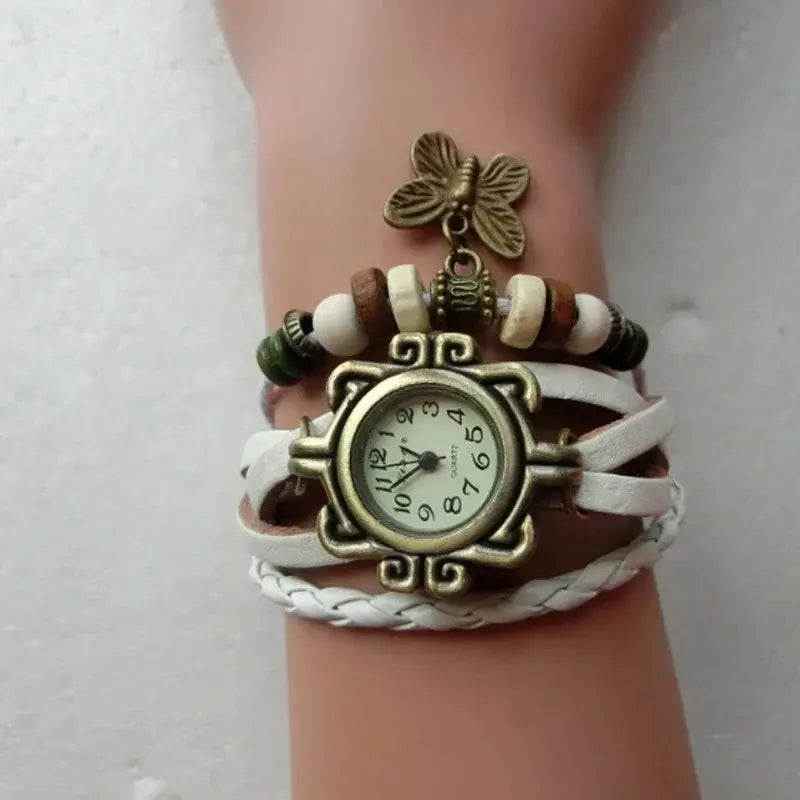 Vintage butterfly bracelet watch with white leather straps and decorative beads by Alcom Distribution