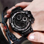 Alcom Distribution waterproof chronograph sports watch with black dial and rugged design on wrist
