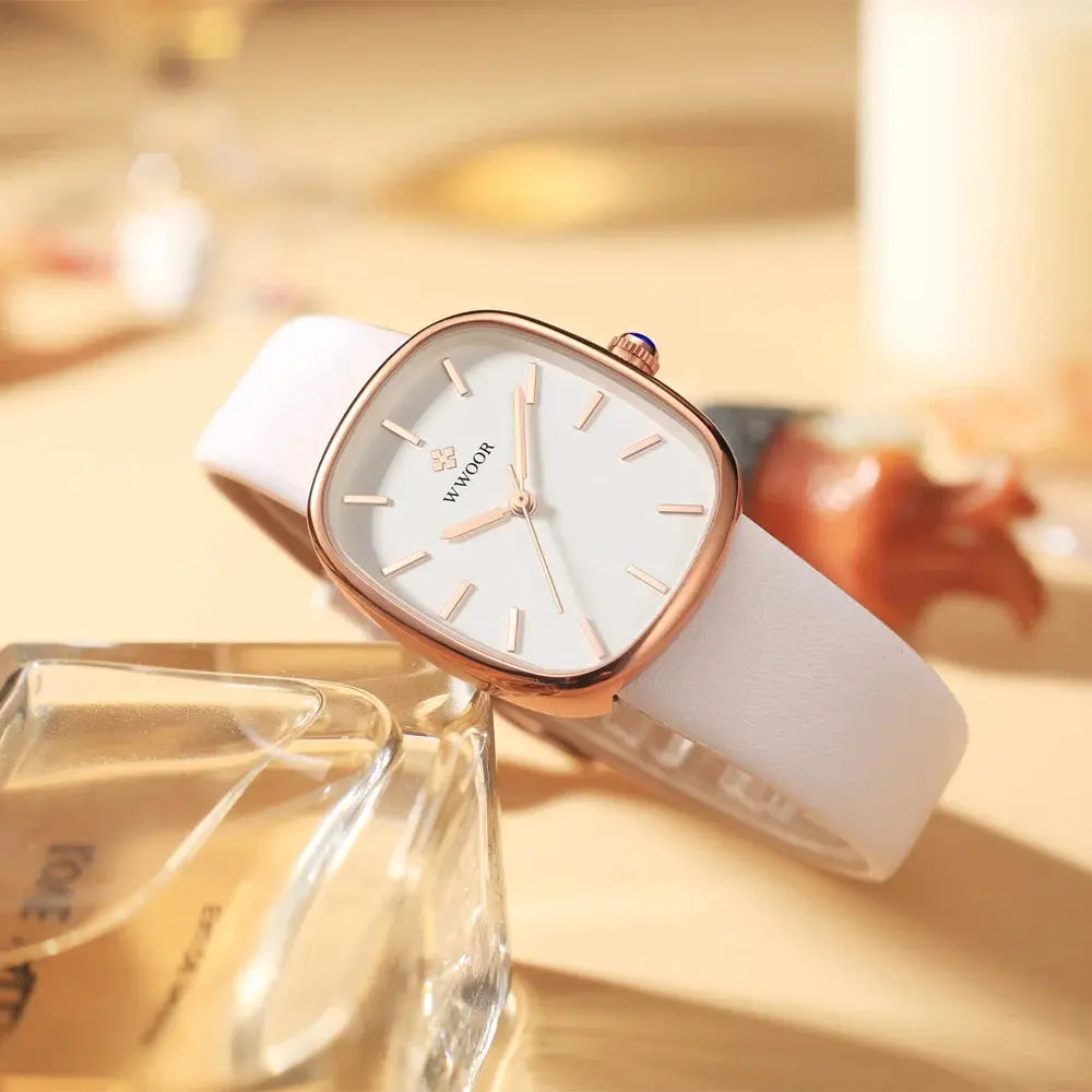 Elegant waterproof quartz watch by Alcom Distribution with white leather strap and rose gold case