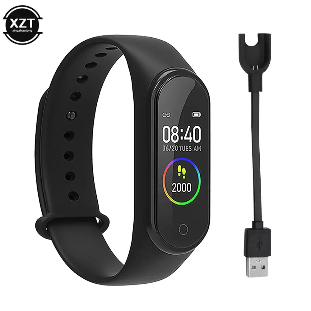 Affordable fitness tracker watch by Alcom Distribution with black strap and USB charging cable