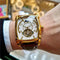 Durable men's wristwatch with gold square case and brown leather strap by Alcom Distribution