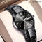 Alcom Distribution fashionable waterproof watch with black dial and metal bracelet