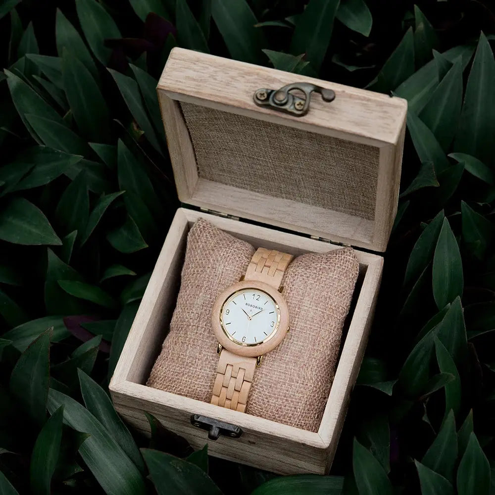 Natural wood wristwatch for women with light wood band and white dial in a wooden box