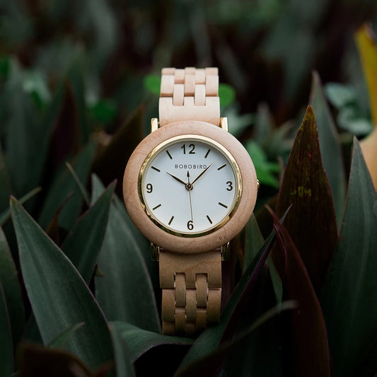 Natural wood wristwatch for women with light wooden strap and white dial by Alcom Distribution