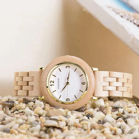 Alcom Distribution natural wood wristwatch for women with light wooden band and round white dial
