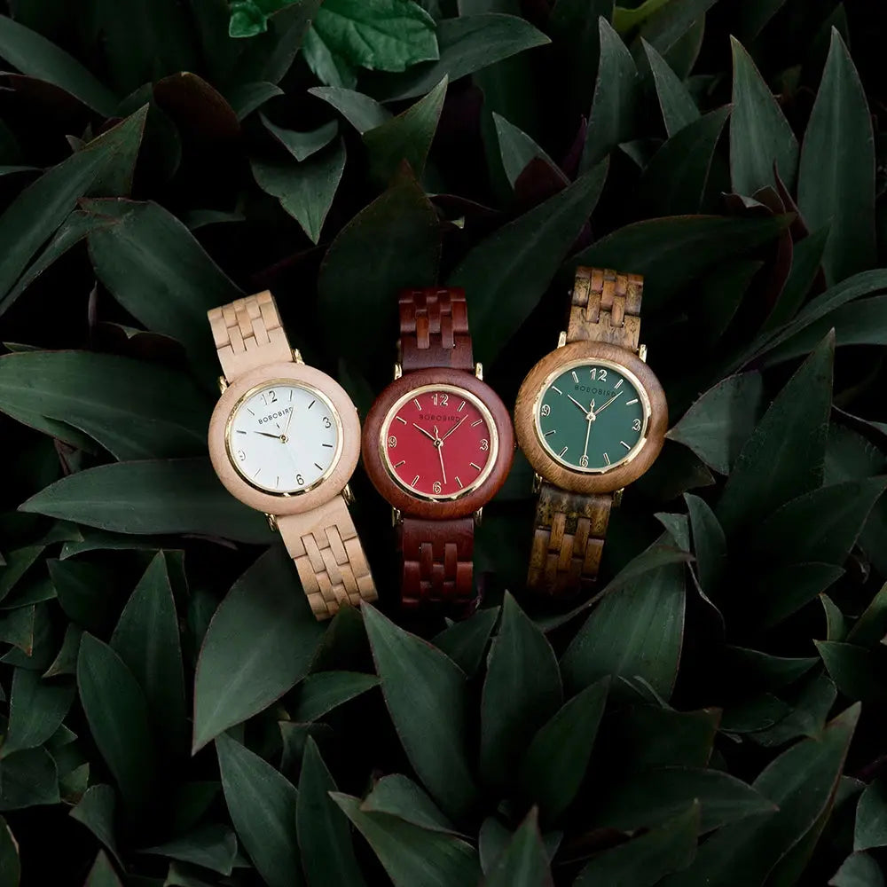 Natural wood wristwatch for women by Alcom Distribution in white, red, and green dials with wooden straps