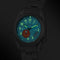 Alcom Distribution titanium adventure watch with luminous hands and date display on metal band