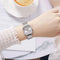 Alcom Distribution silver square quartz watch for women with metal link band on wrist