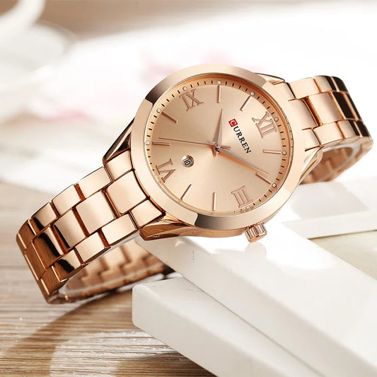 CURREN gold bracelet watch with elegant round dial and Roman numeral markers by Alcom Distribution