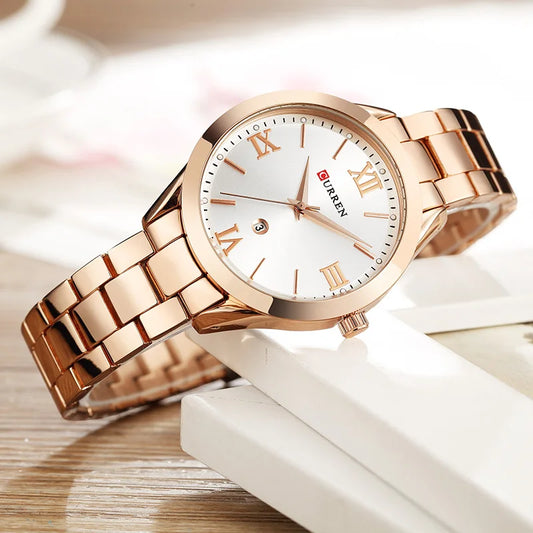 CURREN gold bracelet watch by Alcom Distribution with white dial and Roman numeral markers