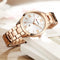 CURREN gold bracelet watch by Alcom Distribution with white dial and Roman numeral markers