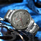 Alcom Distribution stainless steel business watch with silver band and gray dial