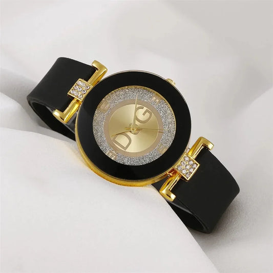 Elegant quartz watch for women with black strap and gold-tone glitter dial accents by Alcom Distribution