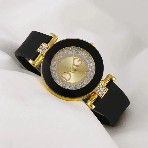 Elegant quartz watch for women with black strap and gold-tone glitter dial accents by Alcom Distribution