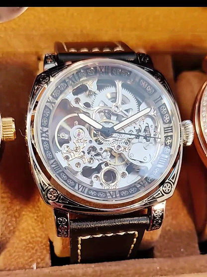 A men's Golden belt fashionable trendy carved hollow carved fully automatic mechanical watch