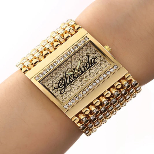 Elegant quartz watch for women by Alcom Distribution with gold tone and crystal embellishments