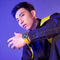 Alcom Distribution model wearing luxury quartz men's wristwatch with yellow strap and bold dial