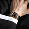 Alcom Distribution luxury men's quartz watch with rectangular black dial rose gold bezel and black bracelet