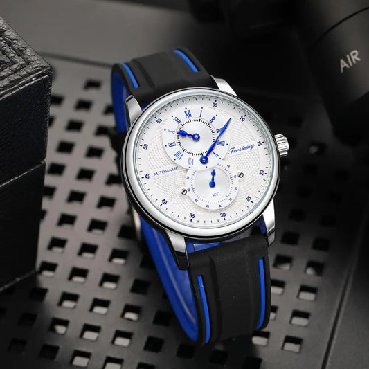 Alcom Distribution automatic mechanical sport watch for men silver case white dial blue hands subdials black silicone strap