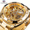 Gold Forsining skeleton watch with visible intricate mechanical gears and metal bracelet