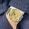 Stylish men's wristwatch by Alcom Distribution with gold and silver metal band and yellow dial