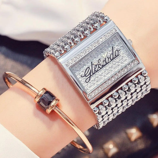 Alcom Distribution quartz analog women's watch silver rectangular crystal studded bracelet band on wrist