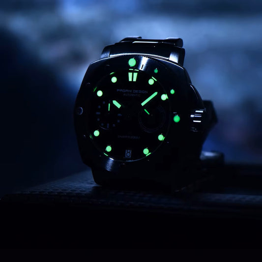 Pagani Design diver watch with luminous markers and black stainless steel case in dark setting