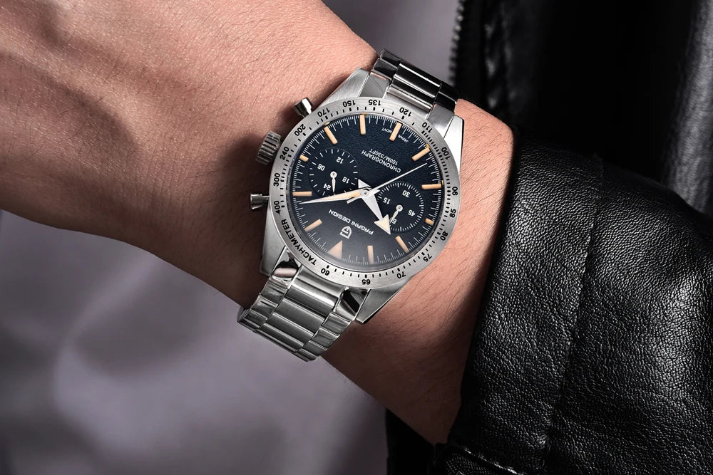 Stylish luxury moon phase watch for men on wrist featuring a stainless steel band and dark dial