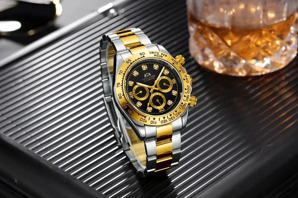 Stylish waterproof stainless steel chronograph watch with black dial and gold accents on a textured surface