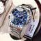 Fashionable men's luxury watch with blue dial and silver metal band by Alcom Distribution