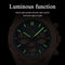 Alcom Distribution men's quartz chronograph watch with luminous green hands and markers and three subdials