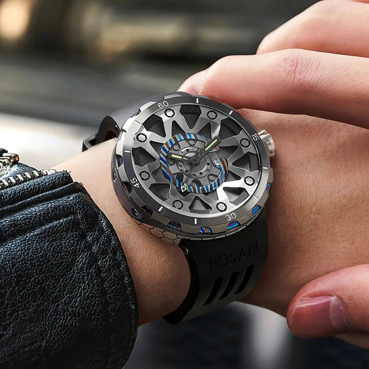 Timascus automatic watch with skeleton dial and black strap worn on wrist