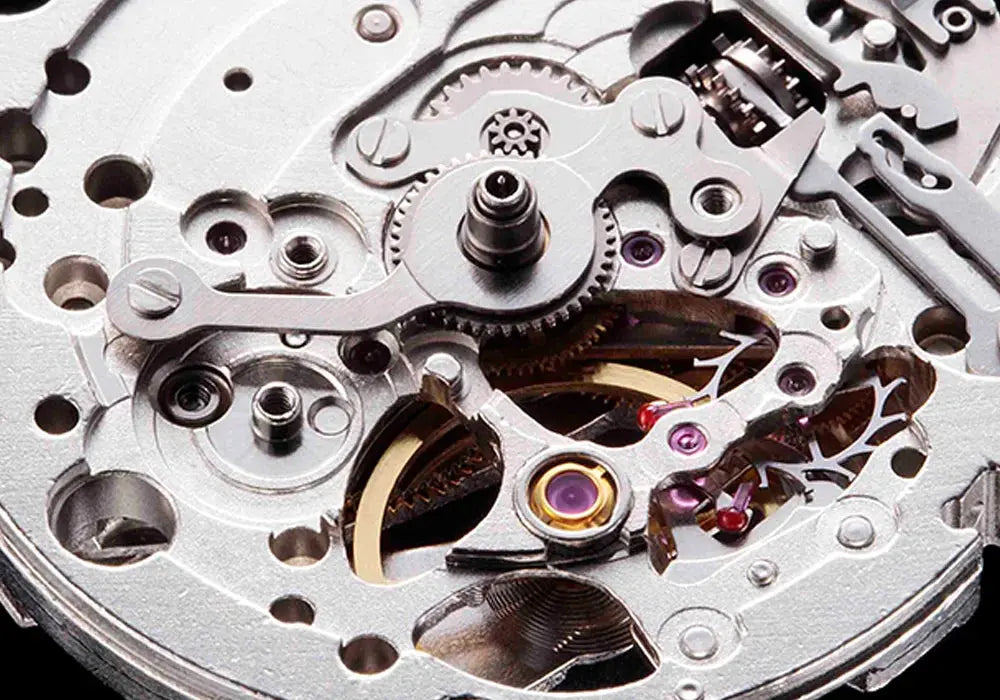 Close-up of intricate gears and mechanisms inside a Timascus automatic watch