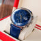 Reef Tiger luxury men's watch with blue dial and leather strap displayed in a cream and red box