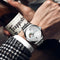 Alcom Distribution SKROX waterproof automatic watch with silver stainless steel band on wrist