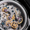 Close-up view of the intricate gears inside the Sugess mechanical chronograph watch by Alcom Distribution