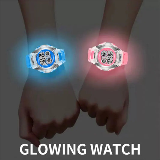 Alcom Distribution glowing children's tech-savvy fitness watch in blue and pink colors on wrists