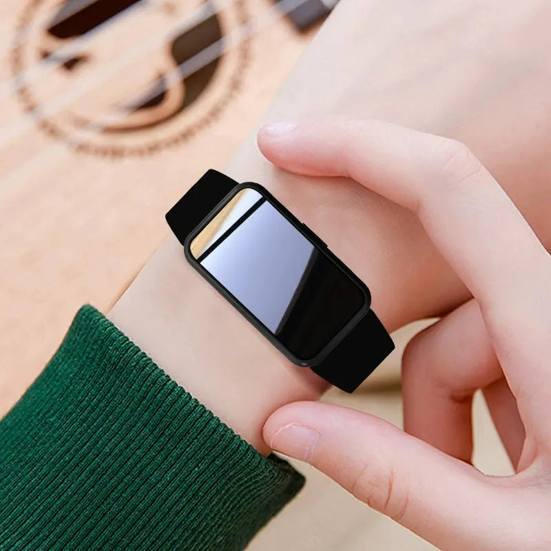Alcom Distribution tech-savvy fitness wearable smartwatch with black band on wrist