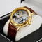 Alcom Distribution vintage golden skeleton watch with brown leather strap and transparent mechanical dial