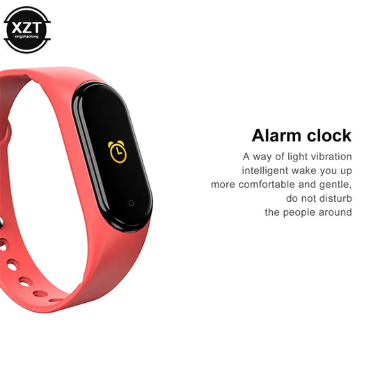 Affordable fitness tracker watch with red band and alarm clock feature by Alcom Distribution